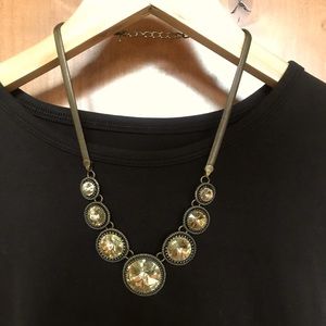 Sparkling 7 disc necklace. Adjustable length.